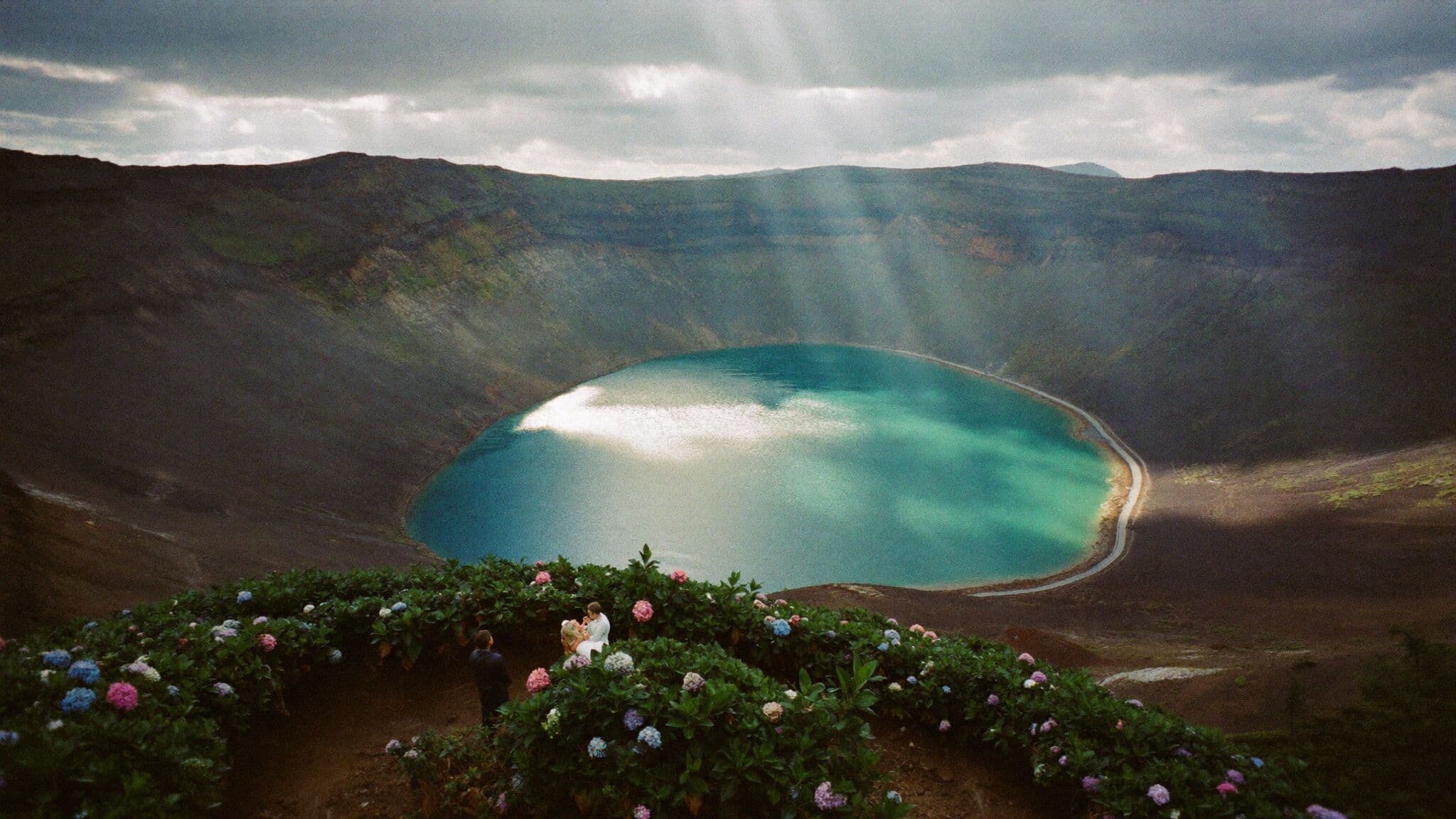 Couple overlooking the twin crater lakes of Sete Cidades during their Azores elopement